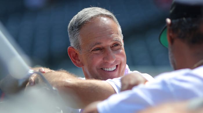 Tony Petitti, COO of Major League Baseball, at the 2019 MLB ASG behind a batting cage